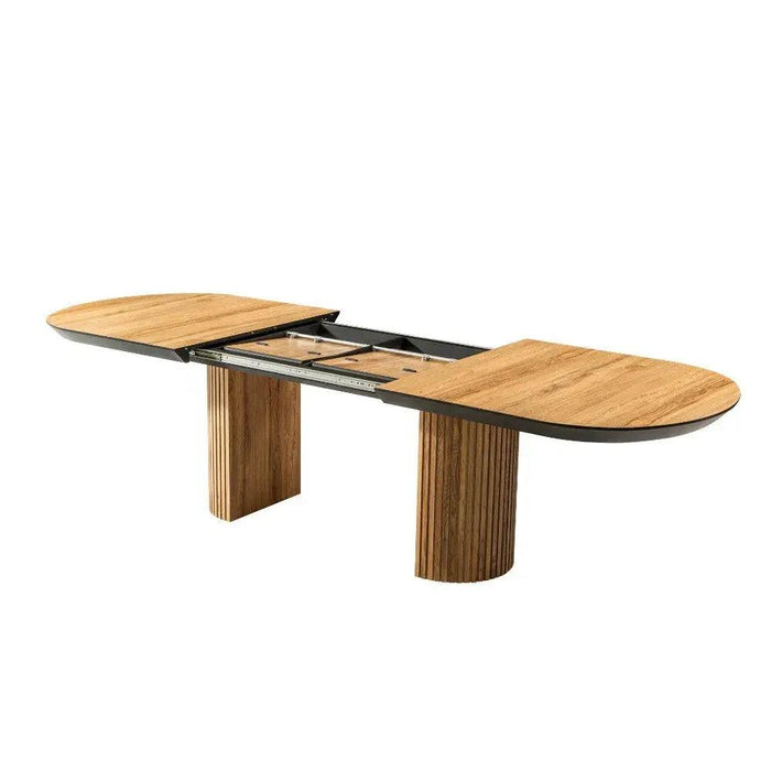 TEMPO | שולחן אוכל מעוצב עם רגלי חריטה ומשטח אובלי - אשריאן | ASHERIAN